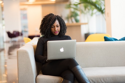 What black-owned businesses must do. black woman with laptop